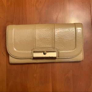 Coach patent leather wallet in nude